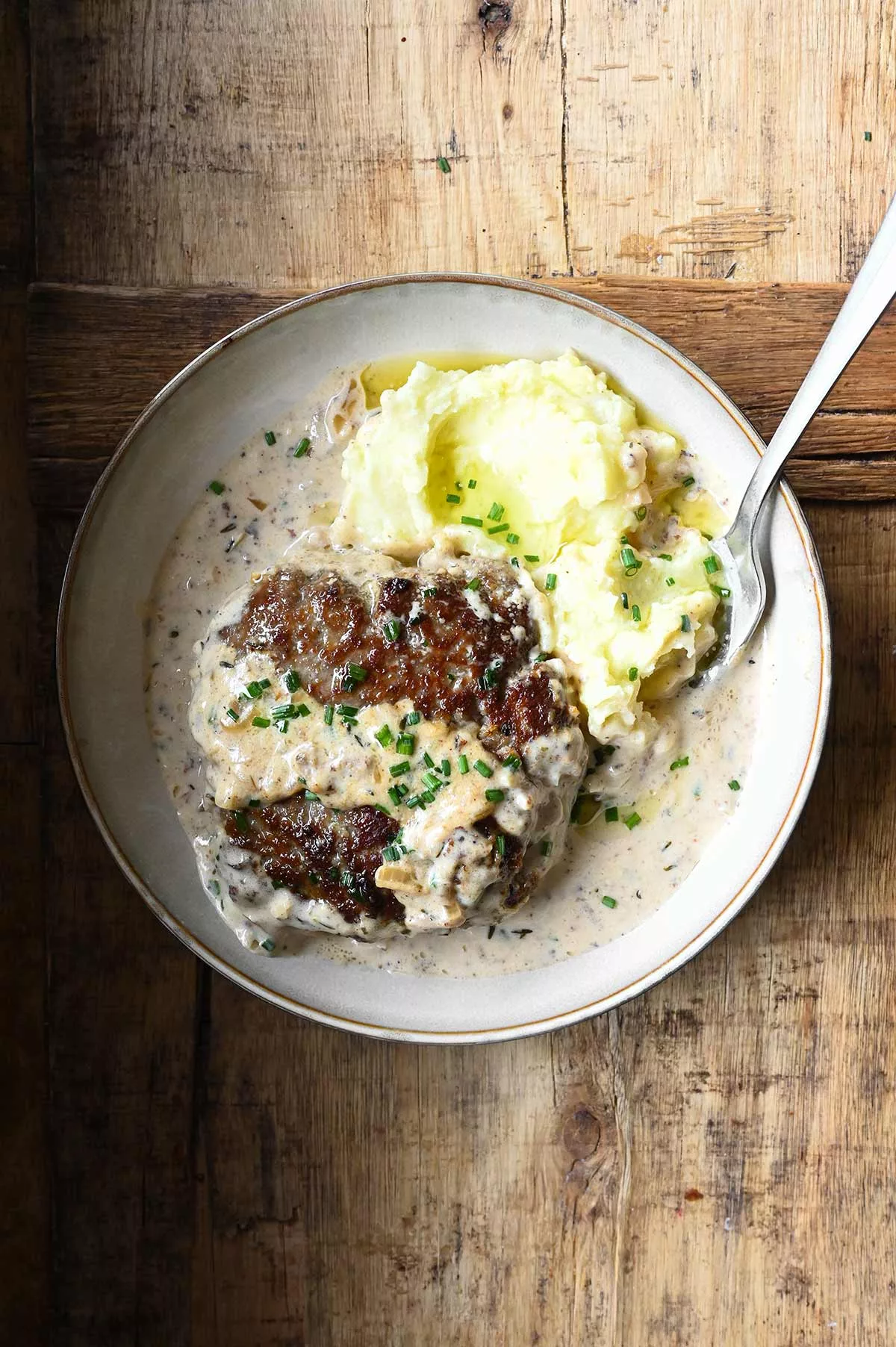 salisbury steaks in horseradish parmesan sauce