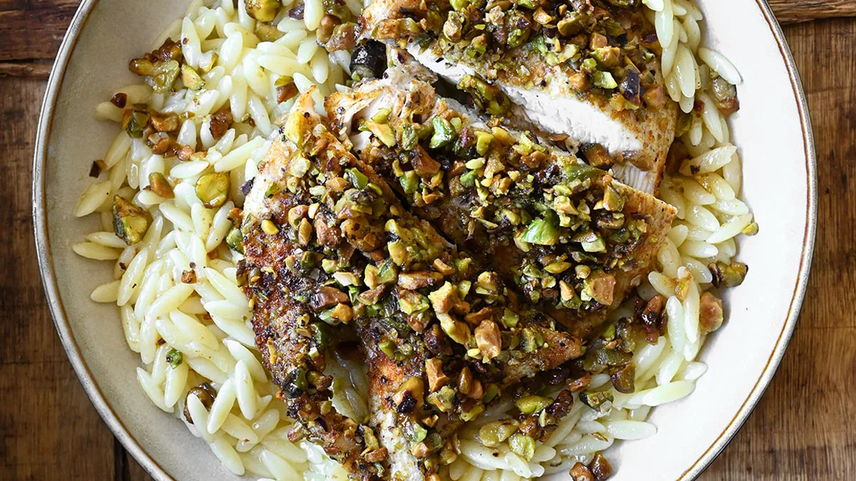 Pistachio Chicken with Lemon Orzo - Serving Dumplings